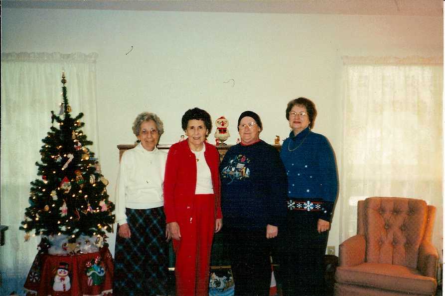 Mary (in black cap) and her friends in December 2006 have been meeting every month since before 1995